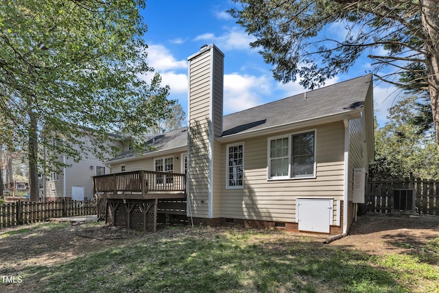9512 Anson Grove Ln, Raleigh, NC 27615 - back of house featuring a chimney, a fenced backyard, a wooden deck, and crawl space