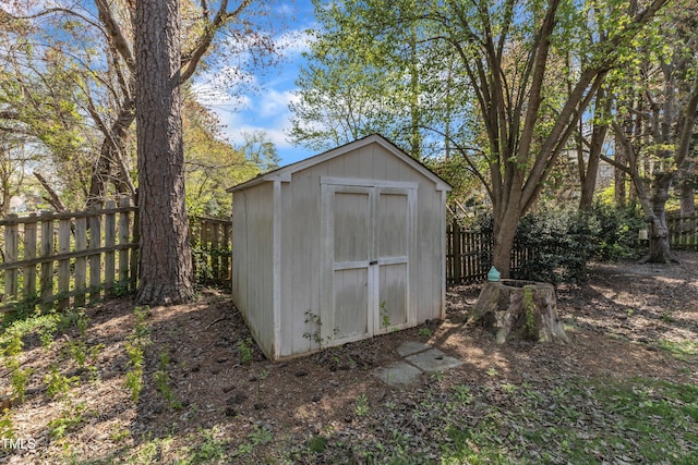 9512 Anson Grove Ln, Raleigh, NC 27615 - view of shed featuring a fenced backyard