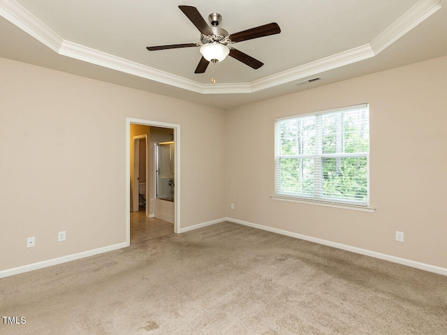 112 Churment Ct, Durham, NC 27703 - carpeted empty room featuring ornamental molding, a tray ceiling, and ceiling fan