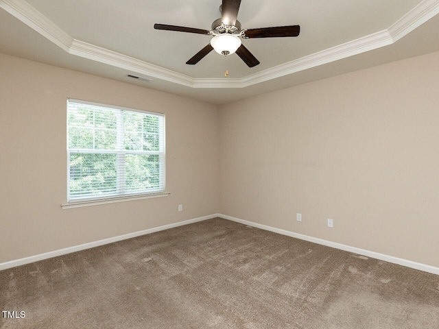 112 Churment Ct, Durham, NC 27703 - carpeted spare room with ornamental molding, a raised ceiling, and ceiling fan