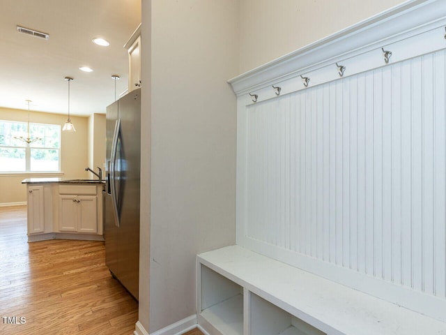 112 Churment Ct, Durham, NC 27703 - mudroom featuring light wood-style flooring and recessed lighting