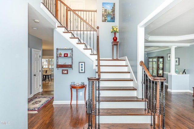 6020 Jones Farm Rd, Wake Forest, NC 27587 - stairway with wood finished floors, ornate columns, crown molding, and baseboards