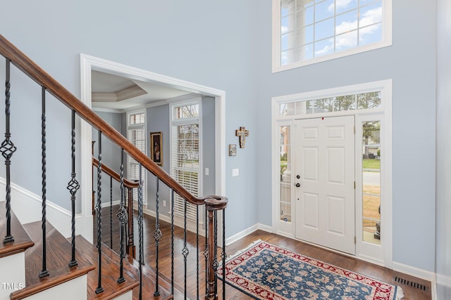 6020 Jones Farm Rd, Wake Forest, NC 27587 - foyer with stairs, wood finished floors, baseboards, and a towering ceiling