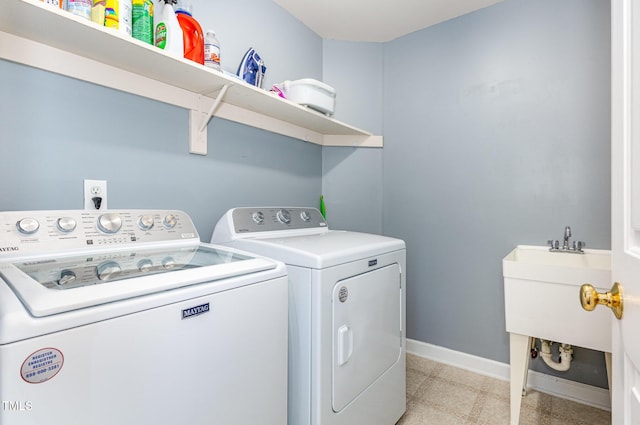 6020 Jones Farm Rd, Wake Forest, NC 27587 - laundry area featuring washer and dryer and baseboards