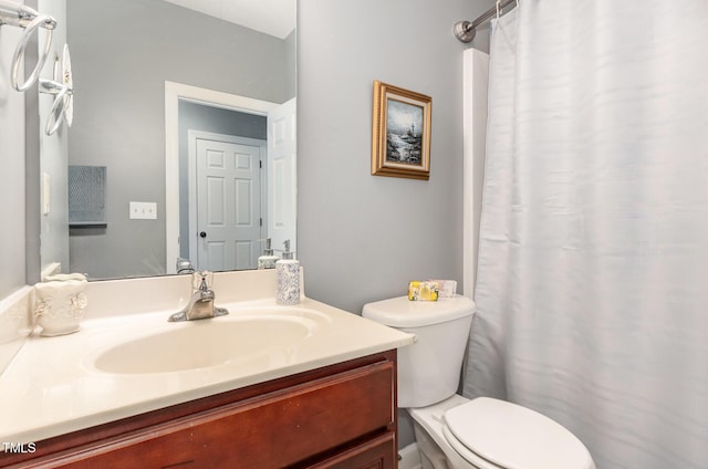 6020 Jones Farm Rd, Wake Forest, NC 27587 - bathroom with toilet, vanity, and a shower with shower curtain