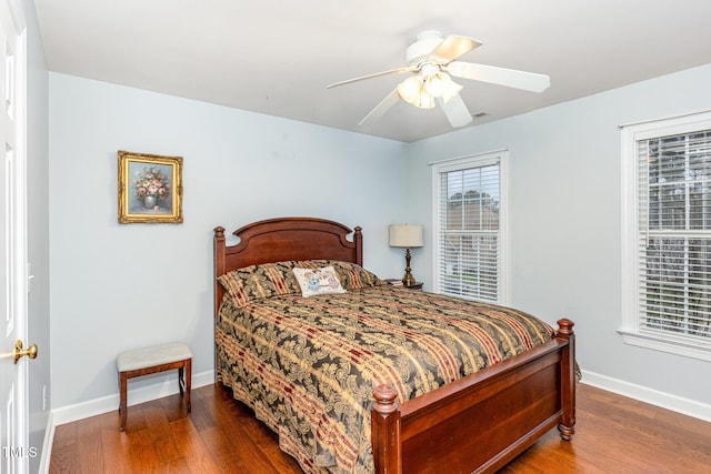 6020 Jones Farm Rd, Wake Forest, NC 27587 - bedroom with wood finished floors, baseboards, and ceiling fan