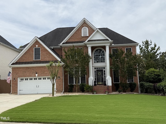 6020 Jones Farm Rd, Wake Forest, NC 27587 - greek revival inspired property featuring concrete driveway, brick siding, a front yard, and an attached garage