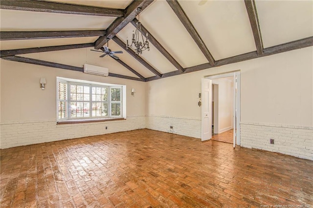 unfurnished room with a wall mounted air conditioner, brick wall, and a wainscoted wall