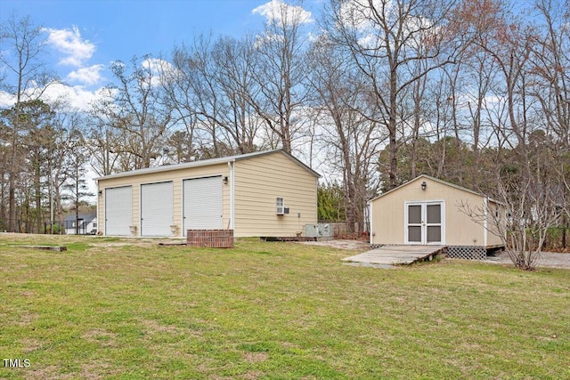 15 Longwood Dr, Youngsville, NC 27596 - view of yard featuring an outbuilding and a garage