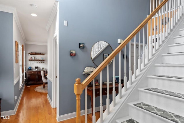 15 Longwood Dr, Youngsville, NC 27596 - stairway with ornamental molding, hardwood / wood-style flooring, baseboards, and recessed lighting