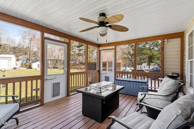 15 Longwood Dr, Youngsville, NC 27596 - sunroom / solarium with a wealth of natural light, a fire pit, and ceiling fan