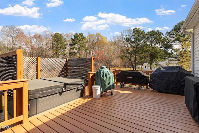15 Longwood Dr, Youngsville, NC 27596 - wooden terrace with a hot tub and a grill