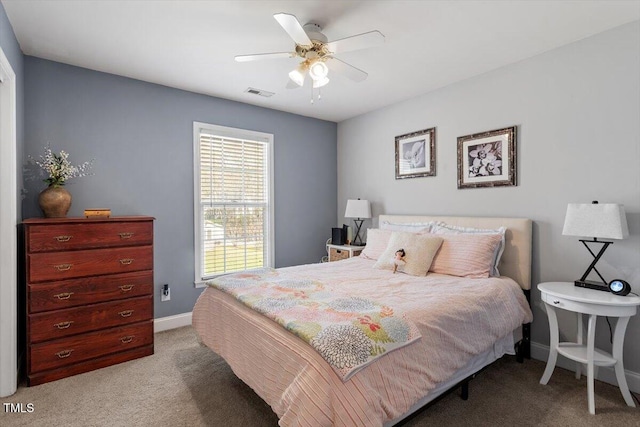 15 Longwood Dr, Youngsville, NC 27596 - carpeted bedroom with baseboards, ceiling fan, and visible vents