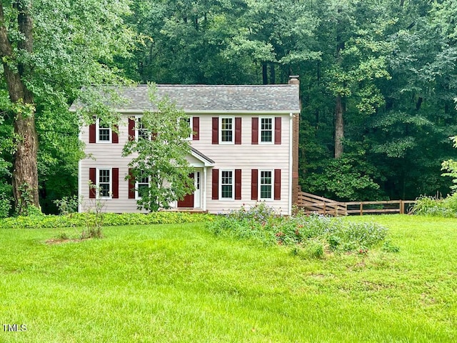 1401 Roy Averette Dr, Raleigh, NC 27603 - colonial house featuring a chimney