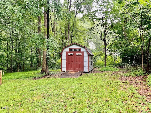 1401 Roy Averette Dr, Raleigh, NC 27603 - view of shed with a view of trees