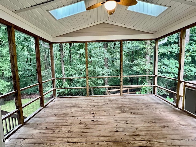 1401 Roy Averette Dr, Raleigh, NC 27603 - unfurnished sunroom with a skylight, a ceiling fan, lofted ceiling, and a wooden deck