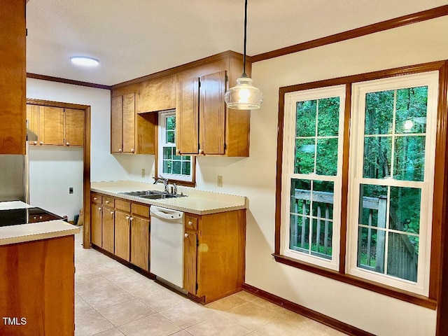 1401 Roy Averette Dr, Raleigh, NC 27603 - kitchen featuring brown cabinets, white dishwasher, ornamental molding, light countertops, and light tile patterned floors