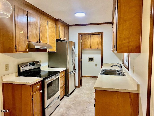 1401 Roy Averette Dr, Raleigh, NC 27603 - kitchen featuring stainless steel appliances, under cabinet range hood, brown cabinetry, and ornamental molding