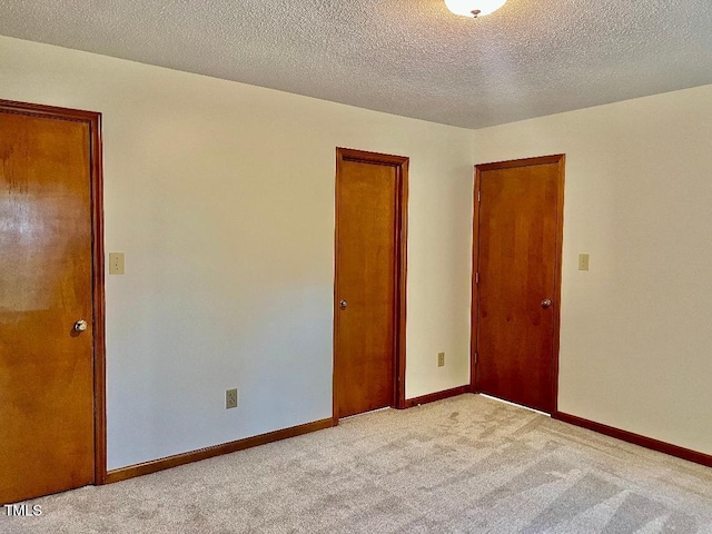 1401 Roy Averette Dr, Raleigh, NC 27603 - spare room featuring light colored carpet and a textured ceiling