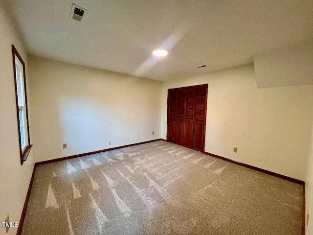 1401 Roy Averette Dr, Raleigh, NC 27603 - unfurnished room with light carpet and baseboards