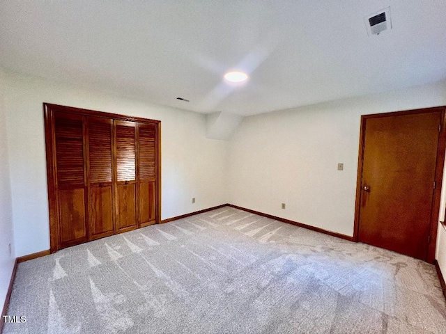 1401 Roy Averette Dr, Raleigh, NC 27603 - unfurnished bedroom with a closet, light colored carpet, and recessed lighting