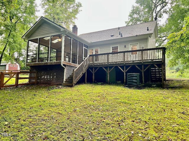 1401 Roy Averette Dr, Raleigh, NC 27603 - rear view of property featuring stairs, a sunroom, a deck, and a chimney