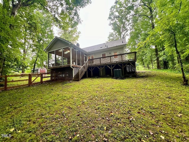 1401 Roy Averette Dr, Raleigh, NC 27603 - rear view of property with stairs, a sunroom, and a deck