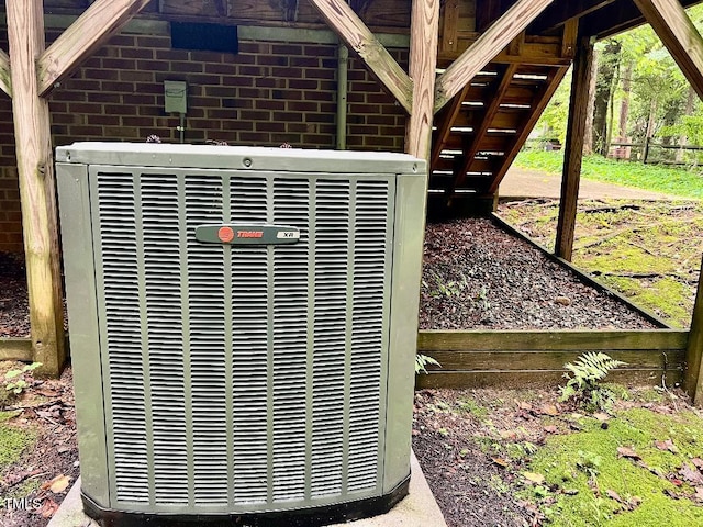 1401 Roy Averette Dr, Raleigh, NC 27603 - exterior view of a central AC unit and stairway