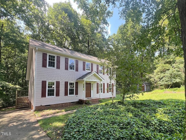 1401 Roy Averette Dr, Raleigh, NC 27603 - colonial-style house featuring crawl space and a storage unit