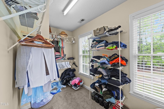 walk in closet with carpet flooring and visible vents