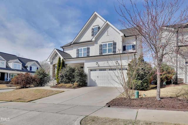 traditional-style house with an attached garage and driveway