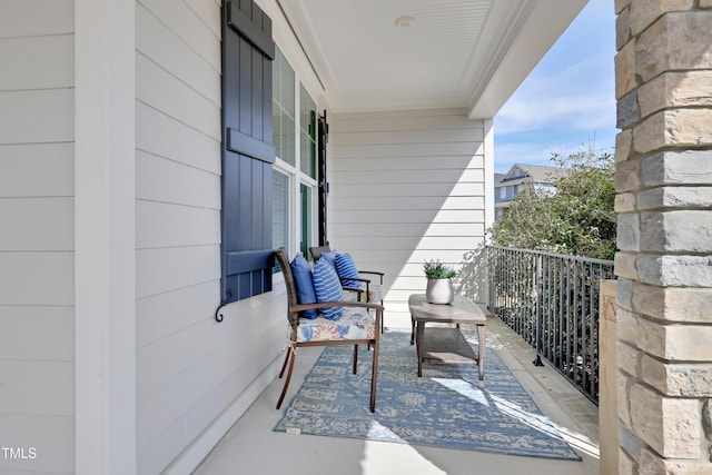 balcony featuring covered porch