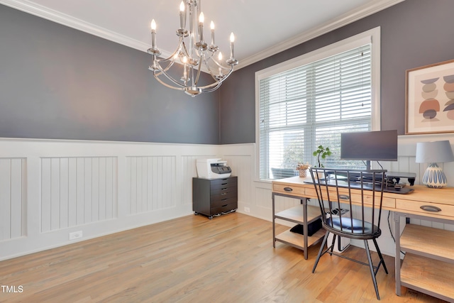 office with crown molding, an inviting chandelier, wainscoting, a decorative wall, and light wood-type flooring