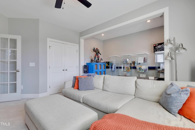living room featuring carpet floors, a ceiling fan, and recessed lighting