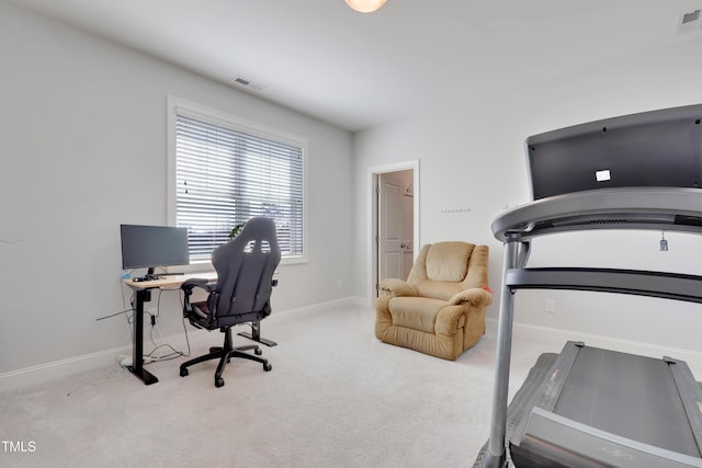 home office featuring baseboards, carpet flooring, and visible vents