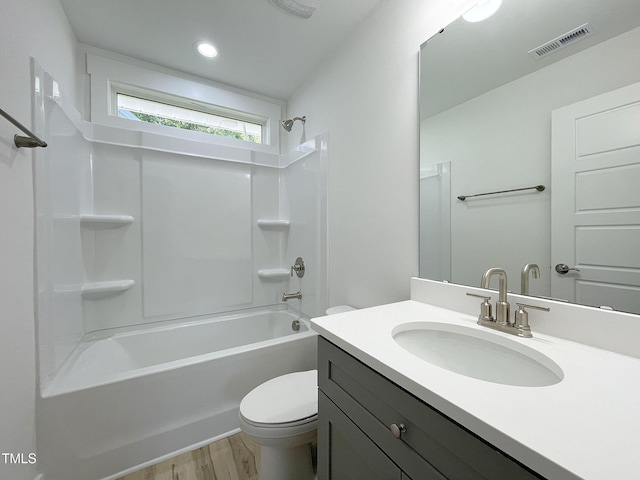 112 Remington Woods Dr, Wake Forest, NC 27587 - full bath with vanity, toilet, washtub / shower combination, and wood finished floors