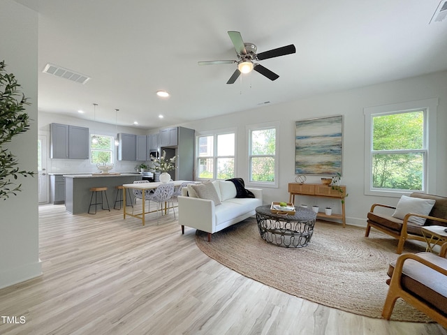 112 Remington Woods Dr, Wake Forest, NC 27587 - living room featuring light wood-type flooring, recessed lighting, ceiling fan, and baseboards