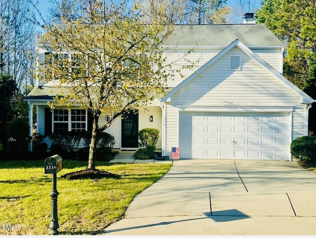 3316 Perkins Ridge Rd, Raleigh, NC 27610 - traditional-style house featuring a garage, concrete driveway, and a front yard