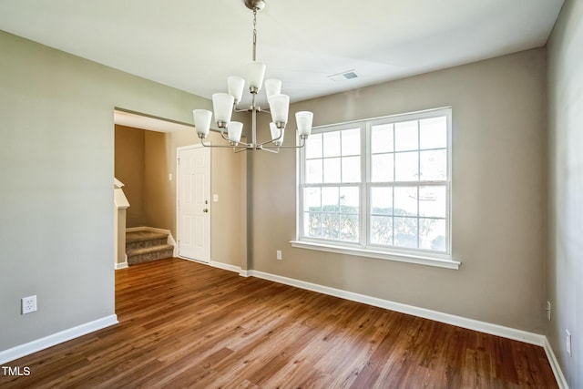 3316 Perkins Ridge Rd, Raleigh, NC 27610 - unfurnished dining area featuring a chandelier and baseboards