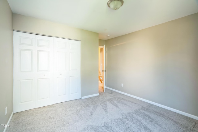 3316 Perkins Ridge Rd, Raleigh, NC 27610 - unfurnished bedroom featuring carpet, baseboards, and a closet
