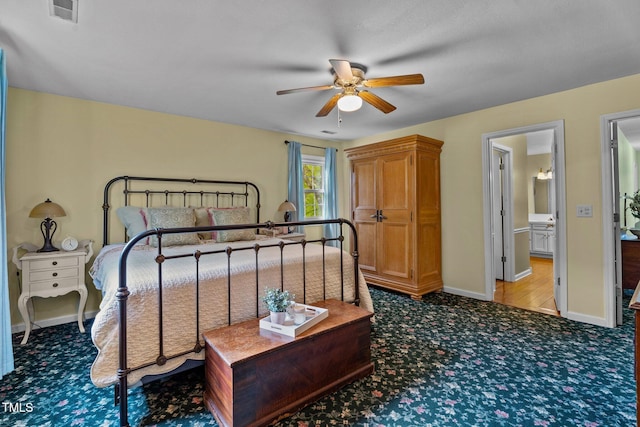 bedroom featuring carpet flooring, visible vents, and baseboards