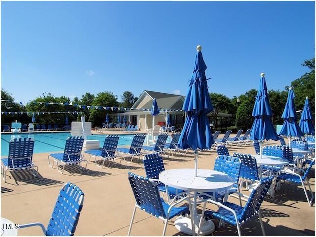 440 Heritage Village Ln, Apex, NC 27502 - community pool with a patio