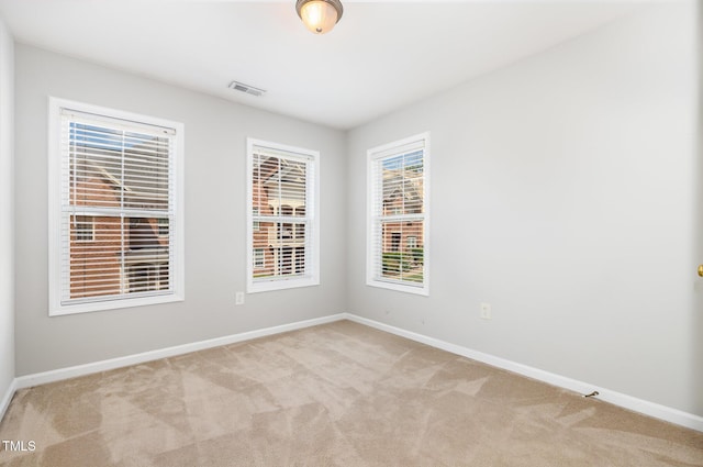 440 Heritage Village Ln, Apex, NC 27502 - carpeted empty room with baseboards