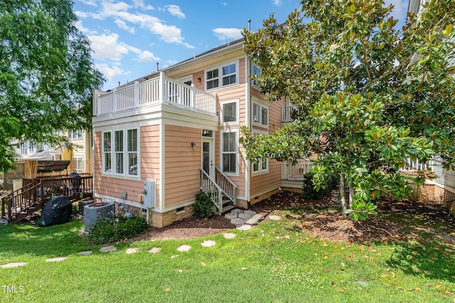 440 Heritage Village Ln, Apex, NC 27502 - back of property featuring a balcony, entry steps, a lawn, and crawl space