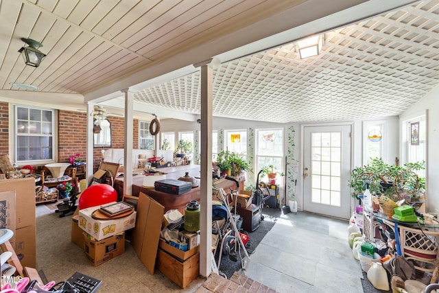 sunroom / solarium featuring a healthy amount of sunlight