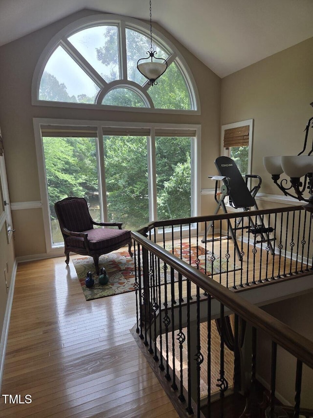 2000 Mountain Laurel Dr, Clayton, NC 27527 - stairs with lofted ceiling, healthy amount of natural light, hardwood / wood-style floors, and baseboards