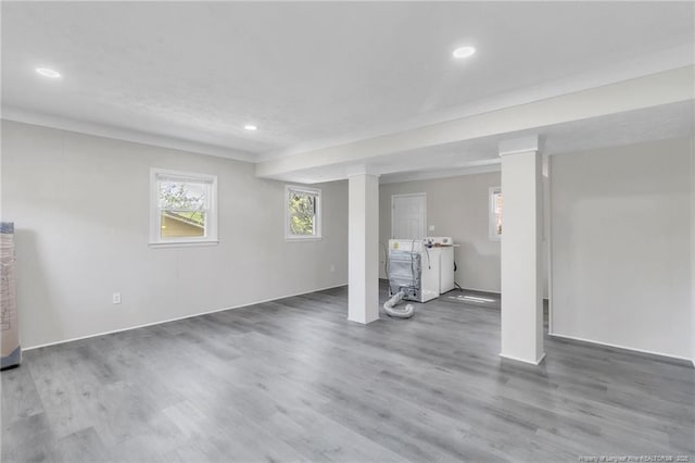 basement featuring wood finished floors and recessed lighting