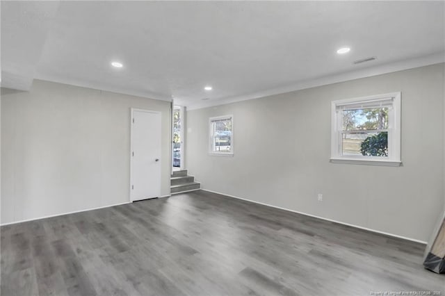 interior space with visible vents, recessed lighting, wood finished floors, and stairway