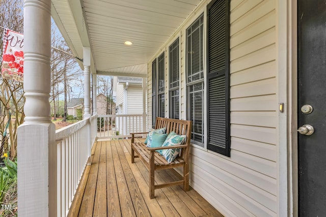 wooden deck featuring a porch