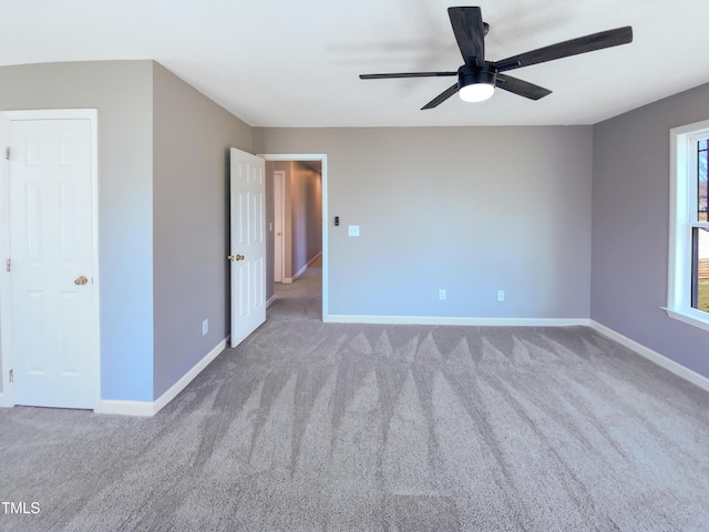 357 Riverwood Dr, Clayton, NC 27527 - unfurnished bedroom featuring baseboards, carpet flooring, and a ceiling fan